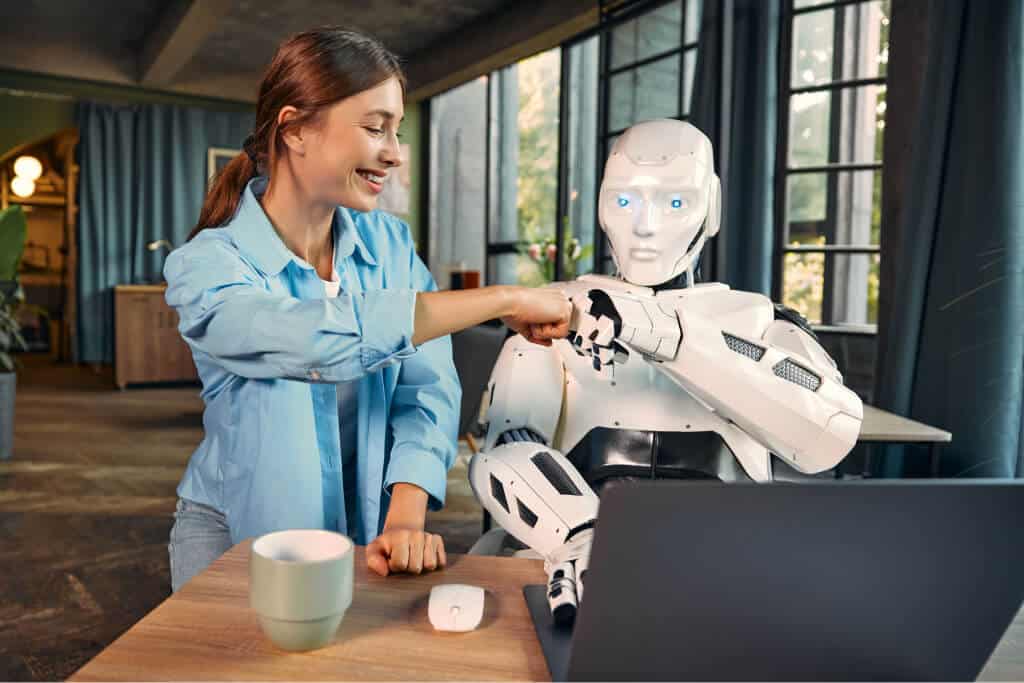 robot and woman working on laptop in office 2023 11 27 05 32 05 utc